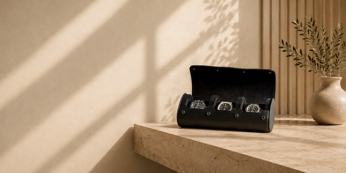 ASCATI three watch roll in leather holding three watches on a table